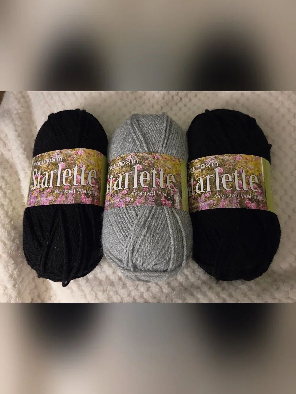 3 SKEINS MARY MAXIM STARLETTE YARN 2 BLK AND 1 LIGHT GRAY